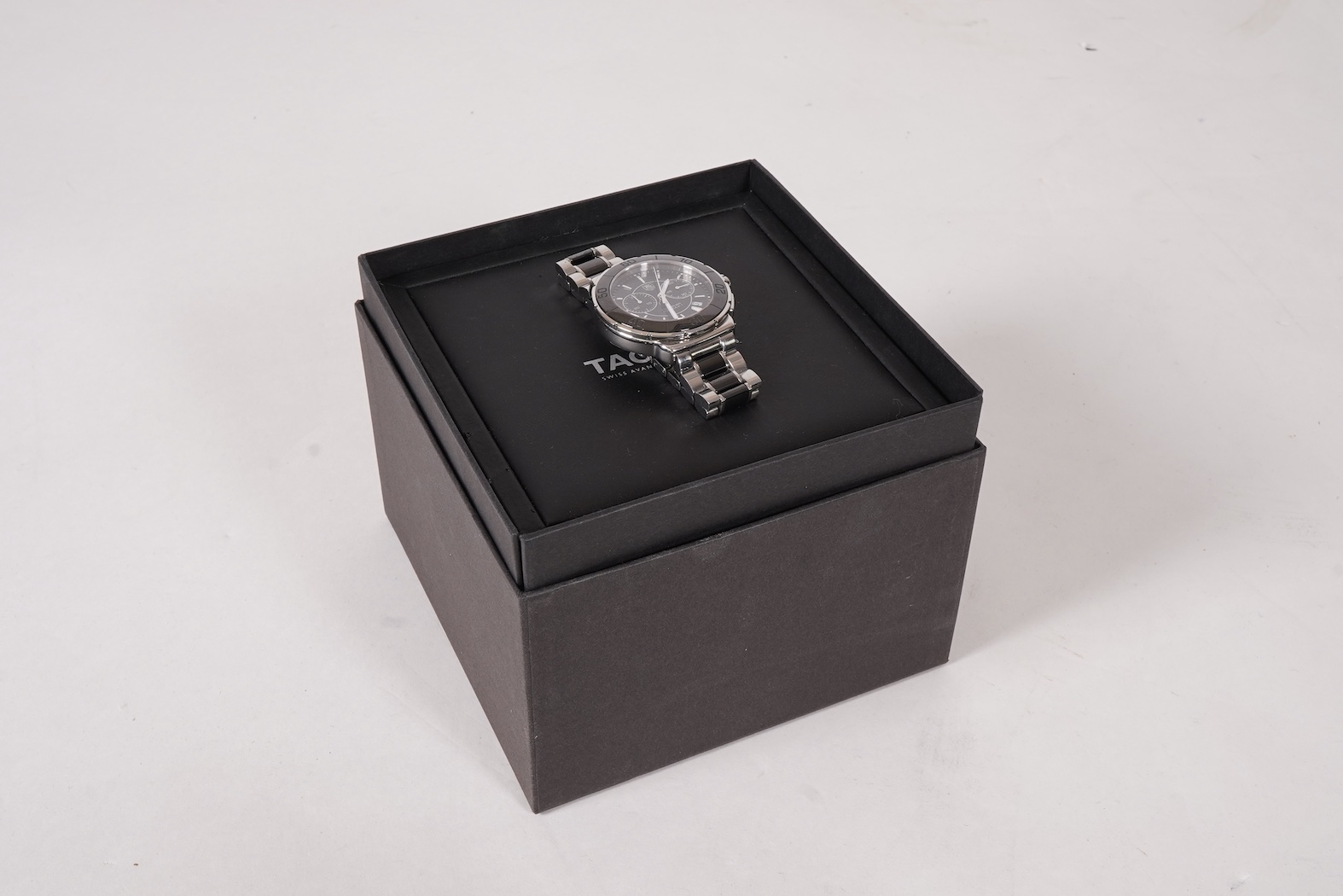 A gentleman's 2011 stainless steel TAG Heuer Formula One quartz chronograph wrist watch, on a stainless steel Tag Heuer bracelet